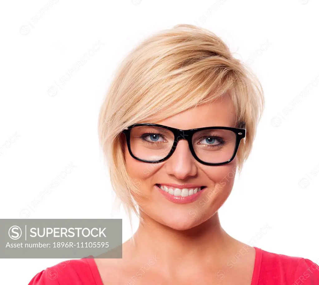 Portrait of beautiful blonde woman with glasses Debica, Poland - SuperStock