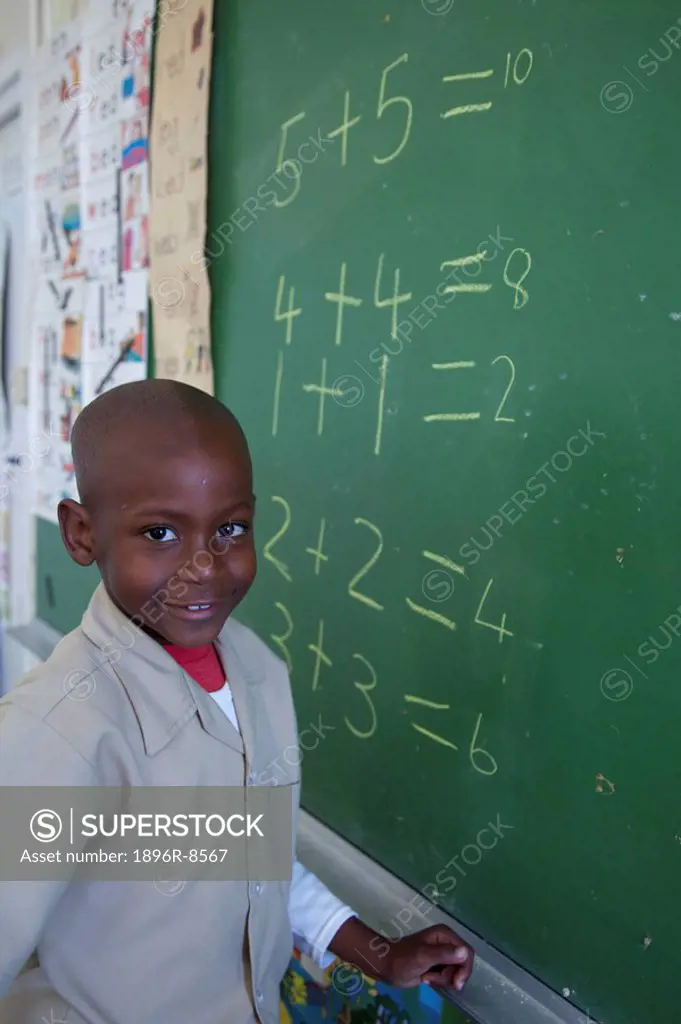 Portrait of a schoolboy at the classroom chalkboard, KwaZulu Nata Province, South Africa