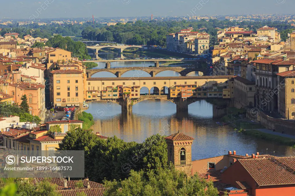 High view along the Arno river to the Ponte Vecchio, the old bridge, Florence, Tuscany, Italy, The historic center of Florence is a UNESCO World Heritage Site