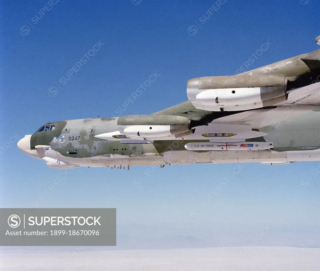 1979 - A right side view of a B-52 Stratofortress aircraft carrying an AGM-109 Tomahawk air-launched cruise missile..