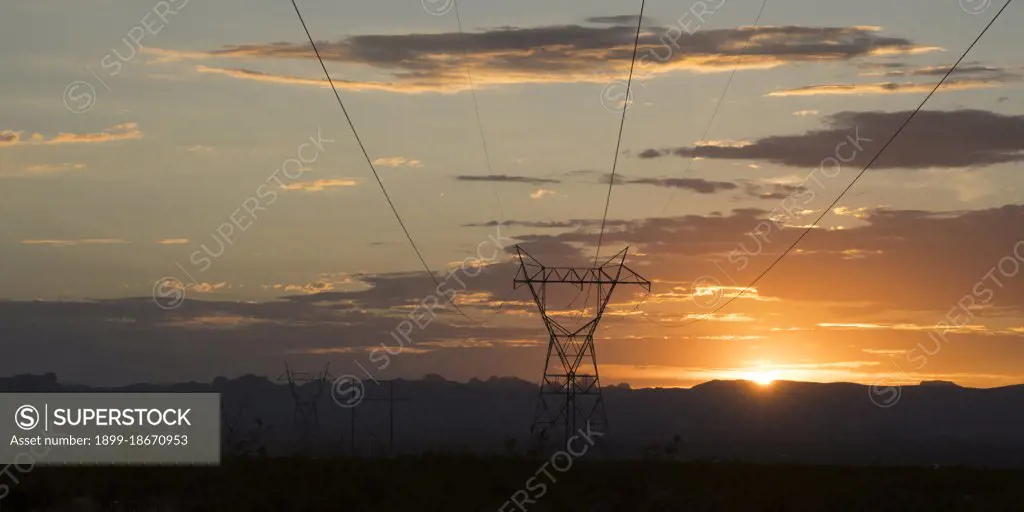 Southern California Power lines at sunset with mountains