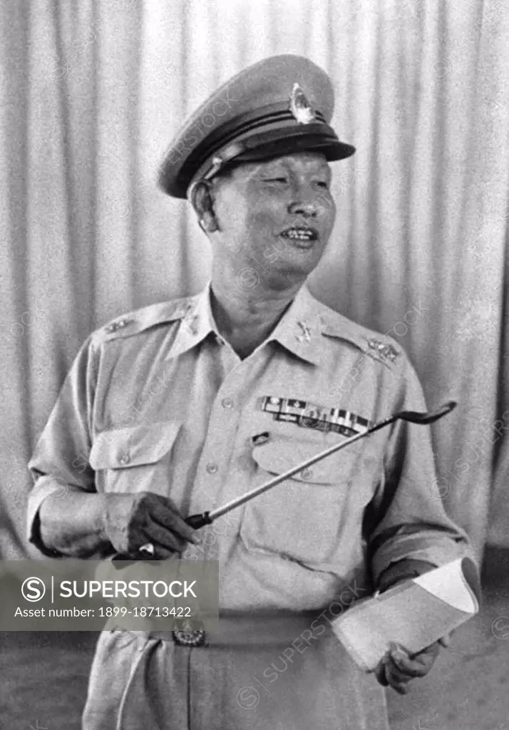 Field Marshal Sarit Thanarat (June 16, 1908 - December 8, 1963) was a Thai career soldier who staged a coup in 1957, thereafter serving as Thailand's Prime Minister until his death in 1963. He was born in Bangkok, but grew up in his mother's home town in Lao-speaking northeastern Thailand and considered himself a northeasterner. During his years as Prime Minister Sarit was a patron of the Lao strongman General Phoumi Nosavan against the communist Pathet Lao guerrillas in the neighboring Kingdom of Laos. Sarit's regime was the most repressive and authoritarian in modern Thai history, abrogating the constitution, dissolving parliament, and vesting all power in his newly-formed Revolutionary Party. Sarit banned all other political parties, imposing very strict censorship of the press after the coup. After Sarit's death, his reputation took a heavy blow when Sarit was discovered to have owned a trust company, a brewery, 51 cars, and some 30 plots of land, most of which he gave to the dozen