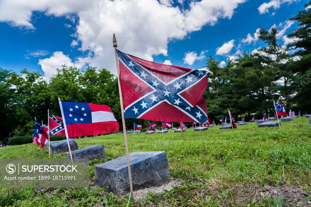 Confederate Memorial State Historic Site with confederate flags on graves, Higginsville, Missouri.