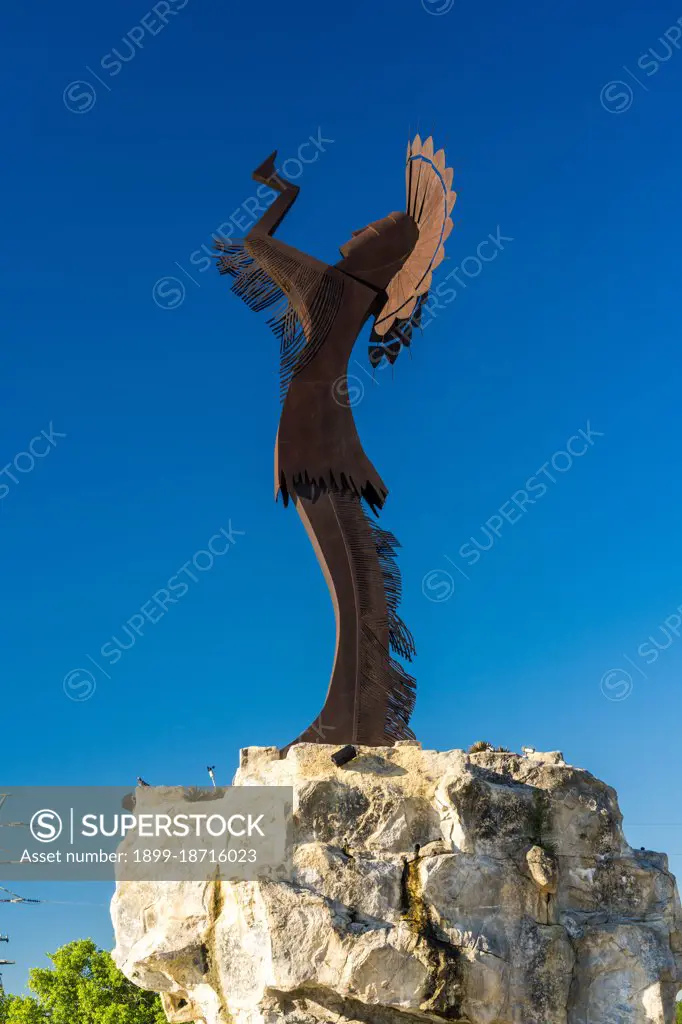 Keeper of the Plains Indian sculpture, Wichita, Kansas on confluence of Little and Big Arkansas Rivers.