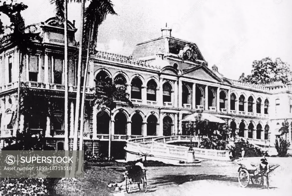 Originally the French governor's palace, then Norodom Palace, then Independence Palace, the magnificent original French building was knocked down to make way for Reunification Palace, which was built on the same site between 1962 -66. It is today a famous landmark in Ho Chi Minh City and a popular museum and tourist attraction. The present building was designed by architect Ngo Viet Thu and was the home and workplace of the President of South Vietnam during the US-Vietnam War. It was famously the site of the end of the Vietnam War during the Fall of Saigon on April 30, 1975, when a North Vietnamese army tank crashed through its gates and a soldier triumphantly hoisted a National Liberation Front flag on its roof.