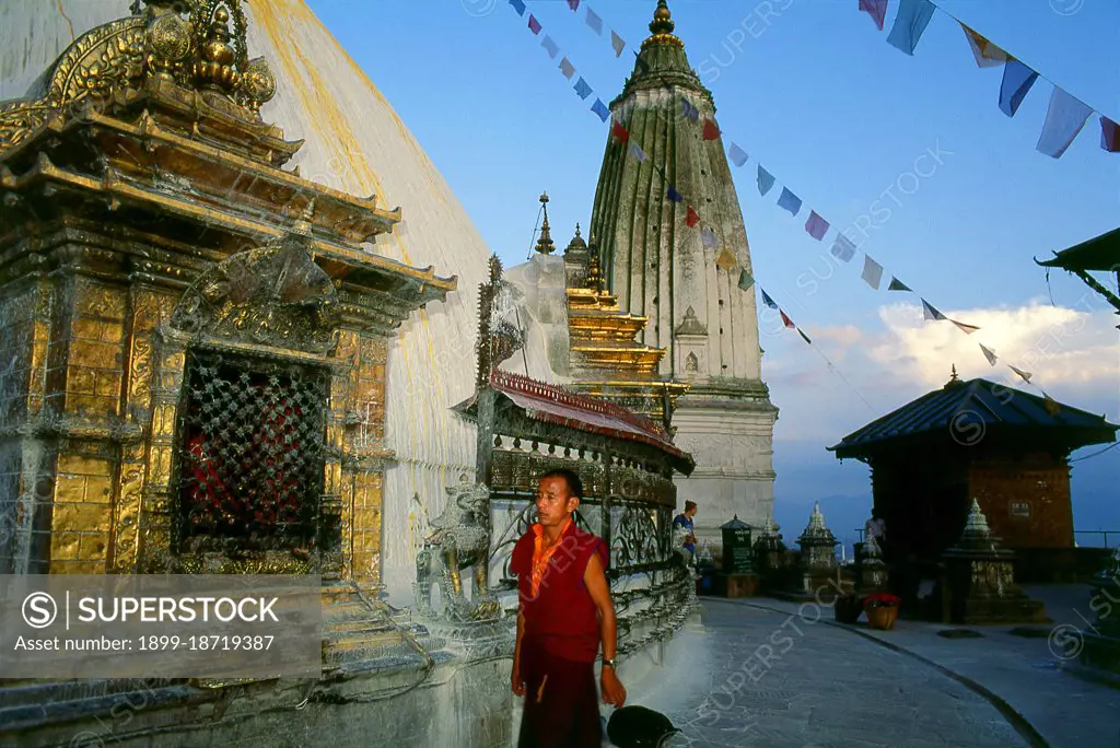 The date of construction of the Svayambhunath stupa, its origins steeped in myth, is unknown. According to the inscriptions on an ancient and damaged stone tablet at Svayambhunath, King Vrishadeva (ca. 400 CE) was the first to build a place of worship on the site. His grandson, King Manadeva I (ca. 464-505) may have made some additions. The Muslim invasion of 1349 undid all the pious building work, the marauding Muslim warriors dismantling every kafir (infidel) sanctuary that they came across. An inscription at Svayambhunath records the date of the Muslim invasion as 20 November 1349, in all probability a very accurate account. After the raids Svayambhunath was restored, and most of the buildings seen today are from the post-invasion period. Swayambhunath is an ancient religious complex atop a hill in the Kathmandu Valley, west of Kathmandu city. It is also known as the Monkey Temple as there are holy monkeys living in parts of the temple in the north-west. The Tibetan name for the sit