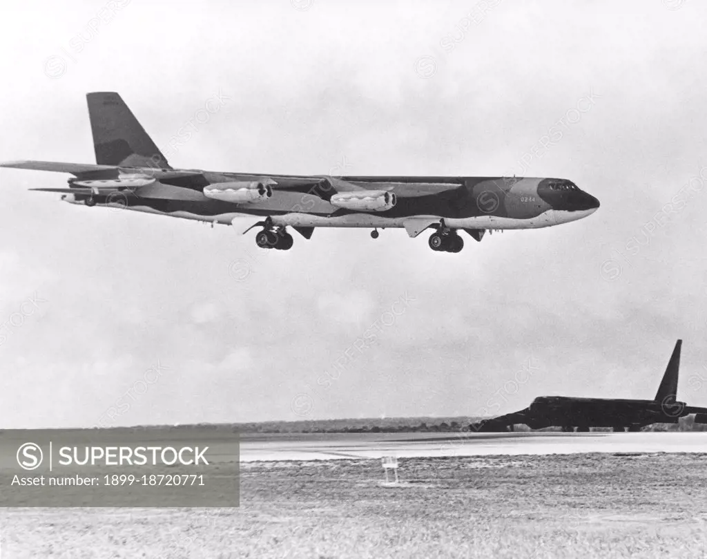 A B-52D Stratofortress aircraft waits beside the runway as a B-52G approaches for landing after completing a bombing mission over North Vietnam during Operation Linebacker. The aircraft are from the Strategic Air Command. The Second Indochina War, known in America as the Vietnam War, was a Cold War era military conflict that occurred in Vietnam, Laos, and Cambodia from 1 November 1955 to the fall of Saigon on 30 April 1975. This war followed the First Indochina War and was fought between North Vietnam, supported by its communist allies, and the government of South Vietnam, supported by the U.S. and other anti-communist nations. The U.S. government viewed involvement in the war as a way to prevent a communist takeover of South Vietnam and part of their wider strategy of containment. The North Vietnamese government viewed the war as a colonial war, fought initially against France, backed by the U.S., and later against South Vietnam, which it regarded as a U.S. puppet state. U.S. military