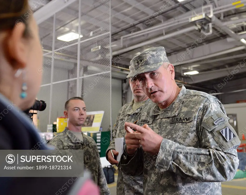 Reportage:   Maj. Gen. John Murray speaks to reporters during the Army Physical Demands Study, at Fort Stewart, Ga., March 13, 2014.