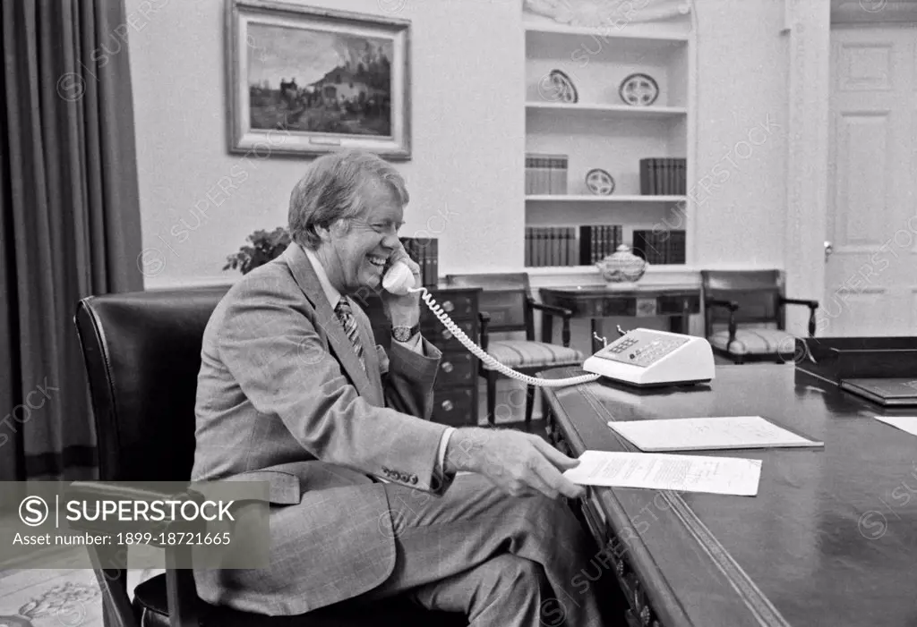 Jimmy Carter at his desk in the Oval Office circa  24 August 1977.