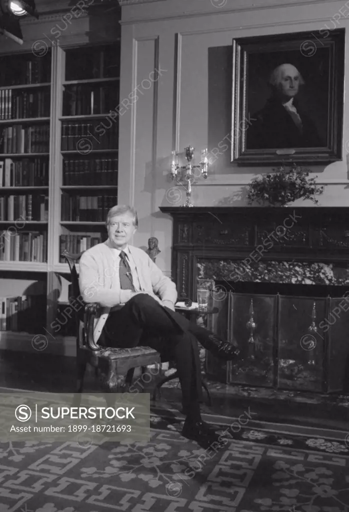 Photograph of Jimmy Carter in the White House Library during a Televised Fireside Chat on Energy circa  2 February 1977.