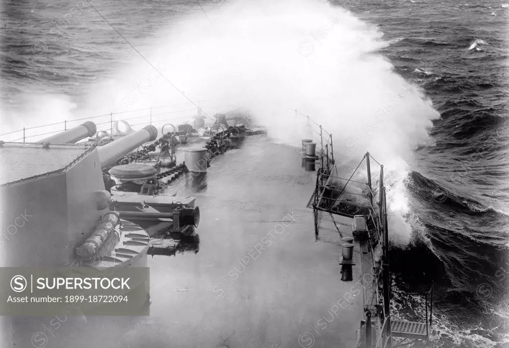 U.S. Navy Battleship caught in a storm at sea circa 1913.