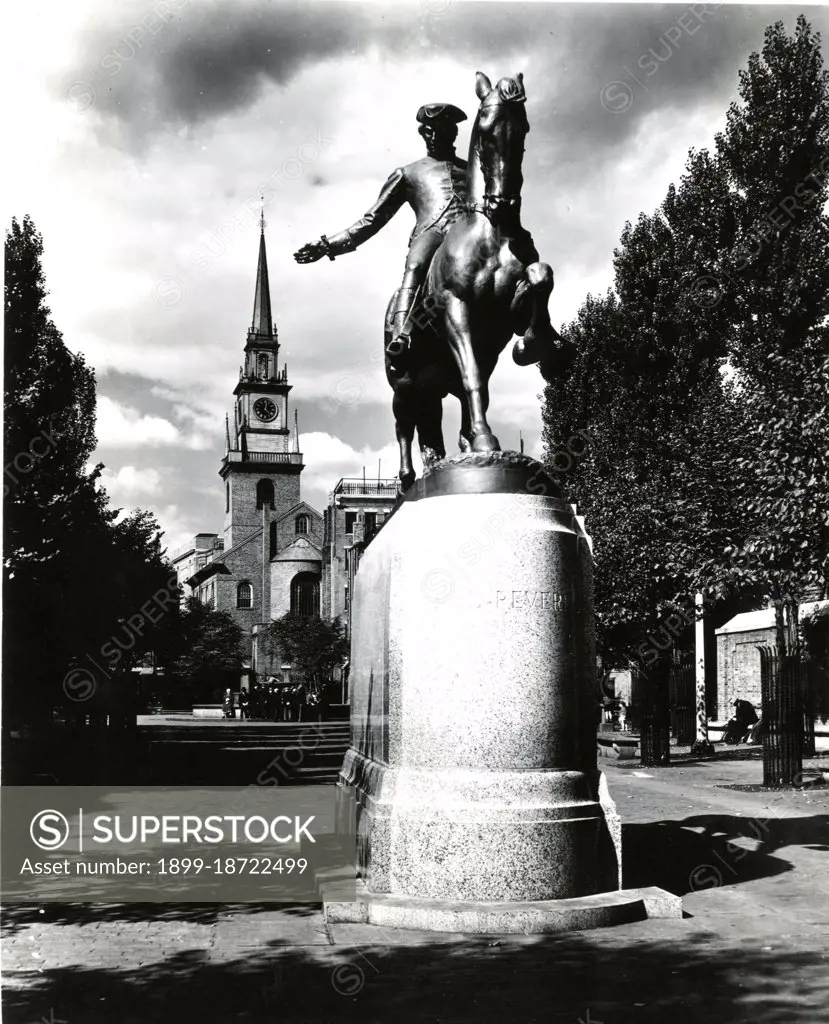 This photograph depicts a view of the Revere Statue with the Old North Church in the background. 1955. 