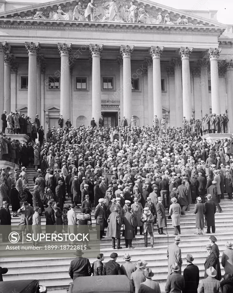 Protesting Congress' delay in considering the soldiers' cash bonus proposal, scores of Washington veterans paraded to the Capitol in a demonstration to seek immediate action circa 1931.