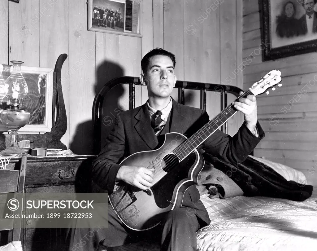 Fields Ward of Bog Trotters Band, with guitar, Galax, Virginia circa 1937.