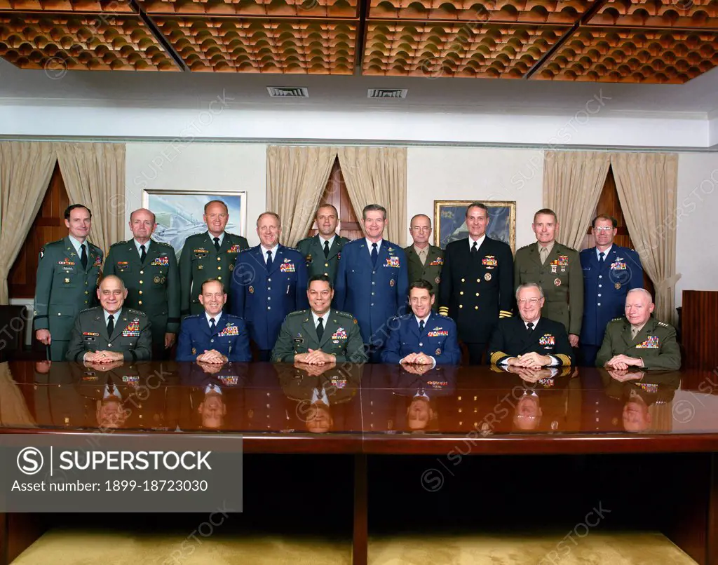 Formal and informal group photographs of the Joint Chiefs of Staff:  General Colin Powell (USA) GEN Carl E. Vuono (USA) GEN Larry D. Welch (USAF) GEN Robert T. Herres (USAF) Admiral Carlisle A. H. Trost (USN) GEN Alfred M. Gray (USMC).  Also other staff members. 