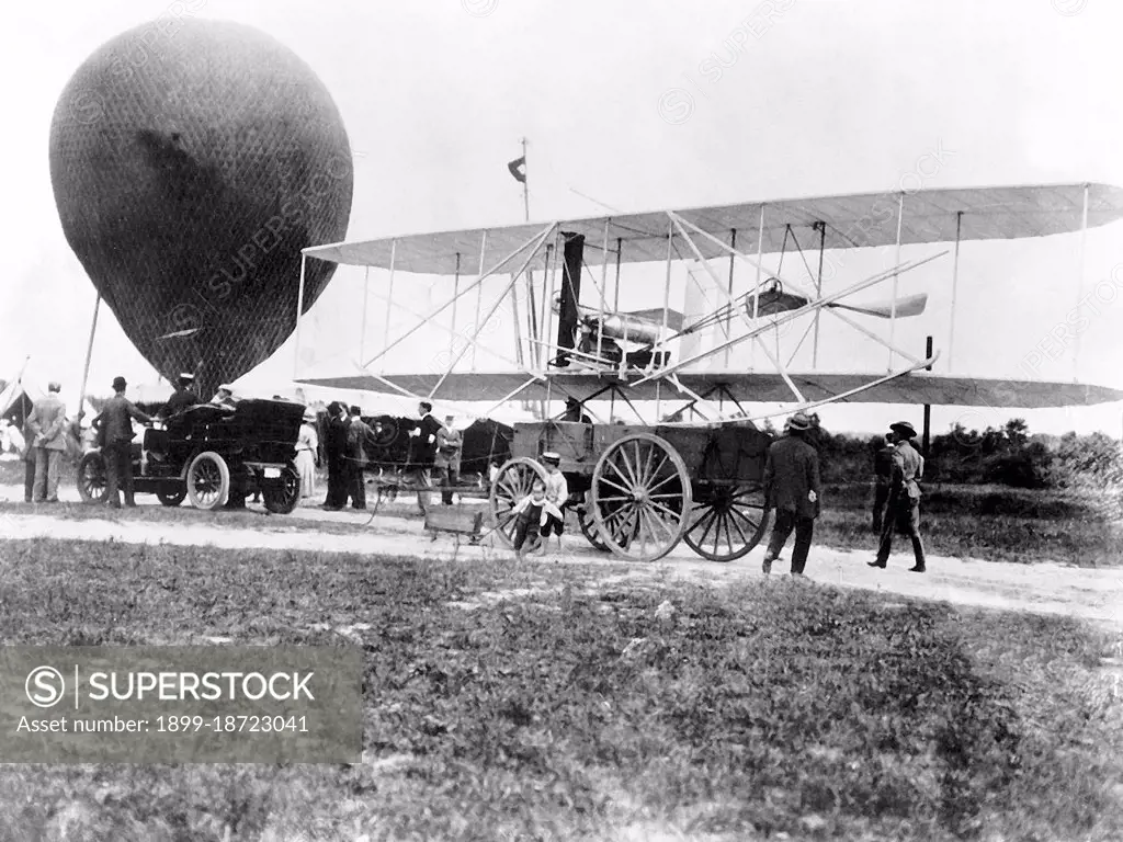 1908 - The Wright Brothers Flyer arrives at Fort Myer, Virginia (VA) aboard a wagon, attracting the attention of children and adults. 