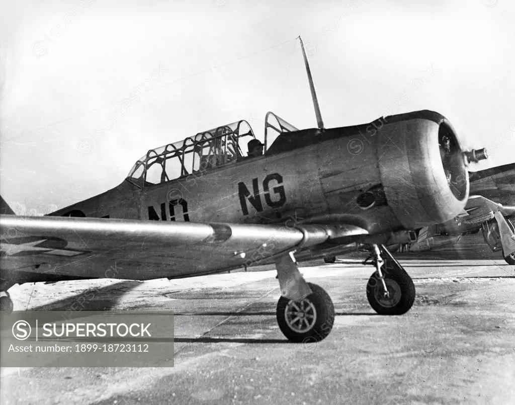 T-6 Texan aircraft on flight line at Hector Field circa 1947.