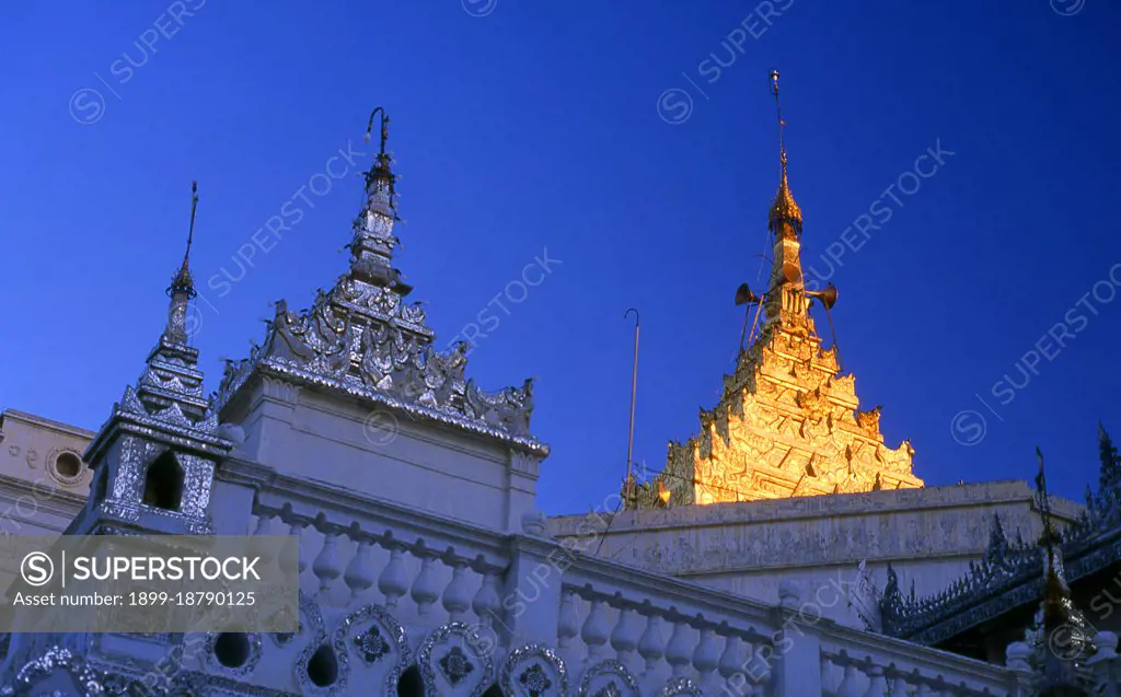 The Setkyathiha Paya was built in 1884 by King Thibaw. The temple contains a 5m tall bronze Buddha image originally cast by King Bagyidaw of Ava in 1823. The image was moved from Ava (Inwa) to Amarapura in 1849 when the Burmese capital moved there. It finally ended up in Mandalay in 1884, again when the capital was moved. Mandalay, a sprawling city of more than 1 million people, was founded in 1857 by King Mindon to coincide with an ancient Buddhist prophecy. It was believed that Gautama Buddha visited the sacred mount of Mandalay Hill with his disciple Ananda, and proclaimed that on the 2,400th anniversary of his death, a metropolis of Buddhist teaching would be founded at the foot of the hill.