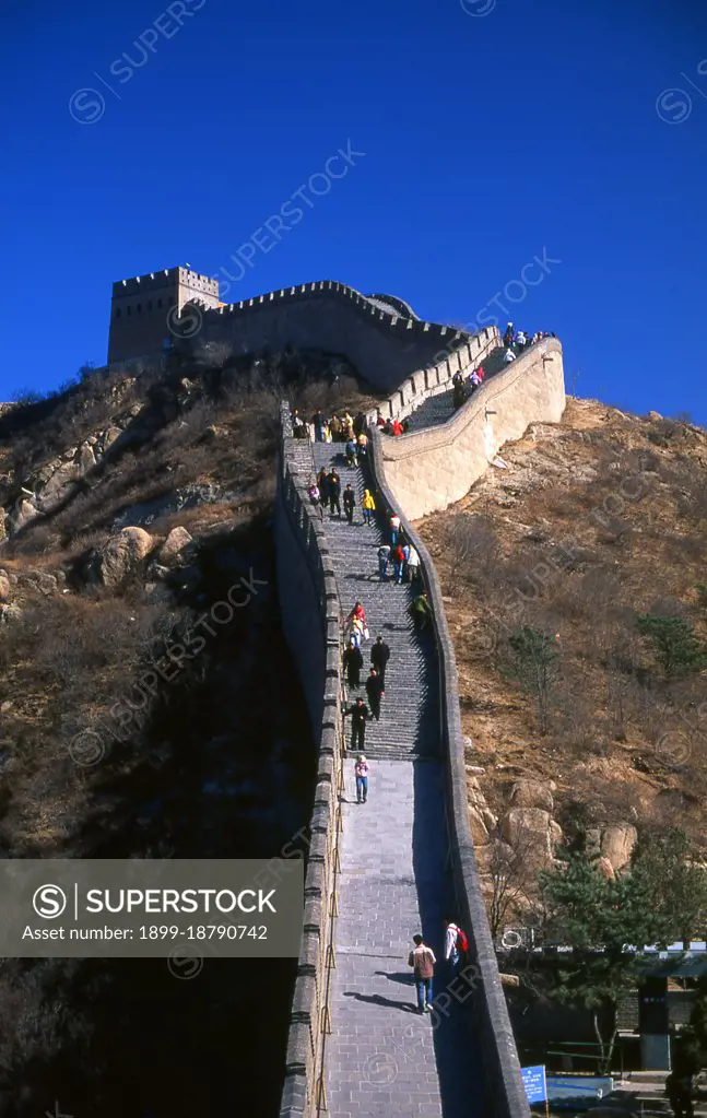 The Great Wall (Wanli Changcheng) is one of mankind's greatest achievements and dates back more than two millennia, when a series of shorter walls were systematically linked during the Qin dynasty (221-206 BCE) to protect Chinas northern borders. The Wall, originally built to keep out barbarian invaders from the north, stretches more than 5,900km (3,700 miles) from the Bohai Gulf in the Yellow Sea to Jiayuguan in the mountains of Gansu province. While the bulk of the wall is now in ruins, some sections have been repaired in recent years. The Ming rulers, who in 1368 put an end to the alien Mongol Yuan dynasty, forcing them back to their ancestral homelands outside the wall, decided to rebuild the Wall into a formidable barrier, the 'Ten Thousand Li Great Wall'. This enormous project took over 100 years, but in the end failed to prevent the invasion of China by the Manchus in the mid-17th century. As a result, much of the wall in northeast China today dates back to the Ming period.