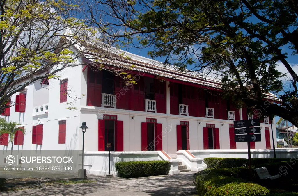 The Songkhla National Museum building was originally built in 1878 and was the residence of the deputy governor of Songkhla, Phraya Suntharanuraksa. It was built in the Southern Thai-Chinese architectural style. The name Songkhla is actually the Thai corruption of Singgora; its original name means 'the city of lions' in Malay. This refers to a lion-shaped mountain near the city of Songkhla. Songkhla was the seat of an old Malay Kingdom with heavy Srivijayan influence. In ancient times (200 AD - 1400 AD), Songkhla formed the northern extremity of the Malay Kingdom of Langkasuka. The city-state then became a tributary of Nakhon Si Thammarat, suffering damage during several attempts to gain independence.