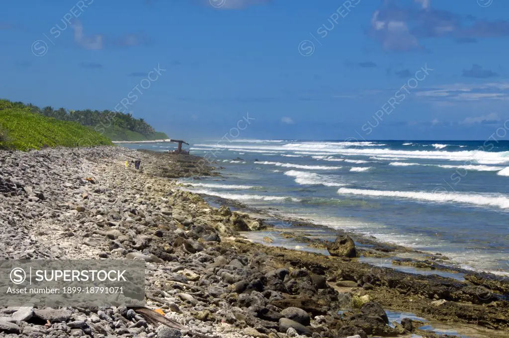 Asia's smallest and least-known nation, the Republic of Maldives, lies scattered from north to south across a 750-kilometre sweep of the Indian Ocean 500 kilometres south-west of Sri Lanka. More than 1000 islands, together with innumerable banks and reefs, are grouped in a chain of nineteen atolls which extends from a point due west of Colombo to just south of the equator. The atolls, formed of great rings of coral based on the submarine Laccadive-Chagos ridge, vary greatly in size. Some are only a few kilometres square, but in the far south the great atoll of Suvadiva is sixty-five kilometres across, and has a central lagoon of more than 2000 square kilometres. The northern and central atolls are separated from each other by comparatively narrow channels of deep water, but in the south Suvadiva is cut off by the eighty-kilometre-wide One-and-a-half-Degree Channel. Addu Atoll is still more isolated, being separated from the atoll of Suvadiva by the seventy-kilometre-wide Equatorial Cha