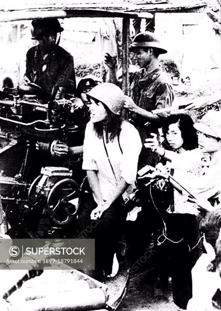 Jane Fonda visited Hanoi in July 1972. Among other statements, she repeated the North Vietnamese claim that the United States had been deliberately targeting the dike system along the Red River. In fact the dike system suffered bomb damage, but was not strategically targeted. In North Vietnam, Fonda was photographed seated on an anti-aircraft battery. In her 2005 autobiography, she writes that she was manipulated into sitting on the battery, and was immediately horrified at the implications of the pictures. After the release of the pictures of Fonda seated behind the anti-aircraft gun, she was dubbed 'Hanoi Jane' by opponents of the anti-war movement in the United States.