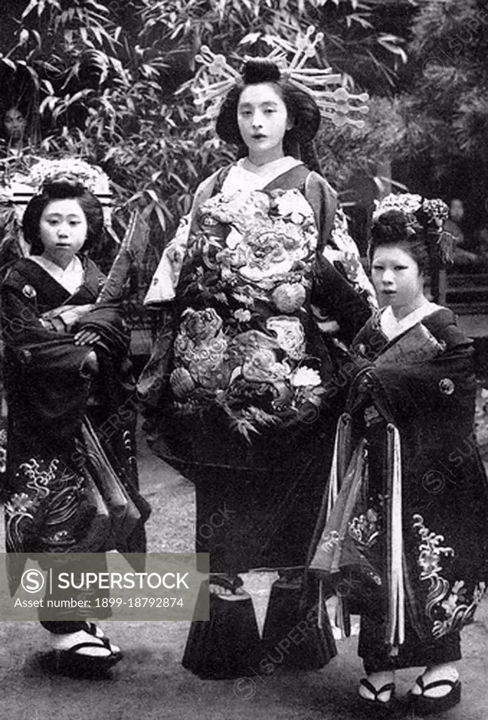 Oiran () were the courtesans of Edo period Japan. The oiran were considered a type of yujo () 'woman of pleasure' or prostitute. However, they were distinguished from the yujo in that they were entertainers, and many became celebrities of their times outside the pleasure districts. Their art and fashions often set trends among the wealthy and, because of this, cultural aspects of oiran traditions continue to be preserved to this day. The oiran arose in the Edo period (1600-1868). At this time, laws were passed restricting brothels to walled districts set some distance from the city center. In the major cities these were the Shimabara in Kyoto, the Shinmachi in Osaka, and the Yoshiwara in Edo (present-day Tokyo). These rapidly grew into large, self-contained 'pleasure quarters' offering all manner of entertainments. Within, a courtesan’s birth rank held no distinction, which was fortunate considering many of the courtesans originated as the daughters of impoverished families who wer