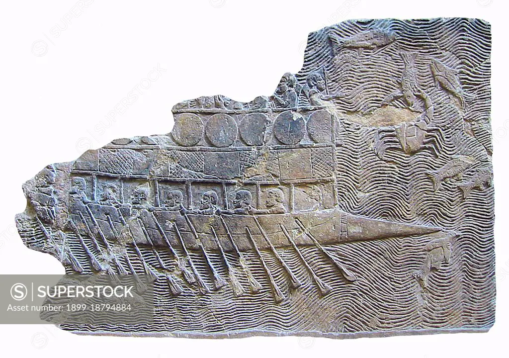 This Assyrian ship was probably built and possibly manned by Phoenicians employed by Sennacherib, the son of Sargon II of Akkad, whom he succeeded on the throne of Assyria (705 - 681 BC). It is a bireme, with two rows of oars. Shields are fastened around the superstructure, as on the fortifications of some city walls. The pointed bow is a ram, for piercing enemy shipping.