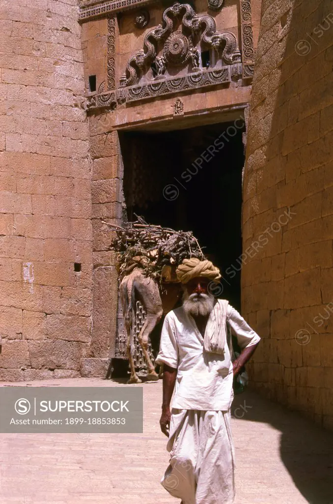 The majority of Jaisalmer's inhabitants are Bhati Rajputs, who take their name from an ancestor named Bhatti, a renowned warrior when the tribe were still located in the Punjab. Shortly after this the clan was driven southwards, and found a refuge in the Indian desert, which was henceforth its home. Deoraj, a prince of the Bhati clan, is believed to be the real founder of the Jaisalmer dynasty. In 1156 Rawal Jaisal, the sixth in succession from Deoraj, founded the fort and city of Jaisalmer, and made it his capital as he moved from his former capital at Lodhruva (situated about 15 km to the north-west of Jaisalmer). The Maharajas of Jaisalmer trace their lineage back to Jaitsimha, a ruler of the Bhatti Rajput clan. The major opponents of the Bhati Rajputs were the powerful Rathor clans of Jodhpur and Bikaner. They used to fight battles for the possession of forts, waterholes or cattle. Jaisalmer was positioned strategically and was a halting point along a traditional trade route traver