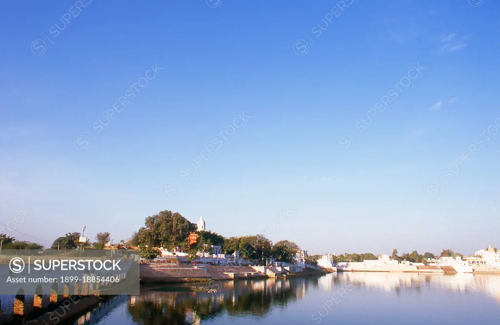 Pushkar is one of India's oldest cities. The date of its actual founding is not known, but legend associates Lord Brahma with its creation. According to the Rajputana Gazetteer, Pushkar was held by Chechi Gurjars (Gujjars) till about 700 years ago. Later Some shrines were occupied by Kanphati Jogis. There are still some priests from the Gujar community in some of Pushkar's temples. They are known as Bhopas. The sage Parasara is said to have been born in Pushkar. His descendants, called Parasara Brahamanas, are found in Pushkar and the surrounding area. The famous temple of Jeenmata has been cared for by Parasara Brahmans for the last 1,000 years. Pushkarana Brahamanas may also have originated here. It is also the venue of the annual Pushkar Camel Fair.