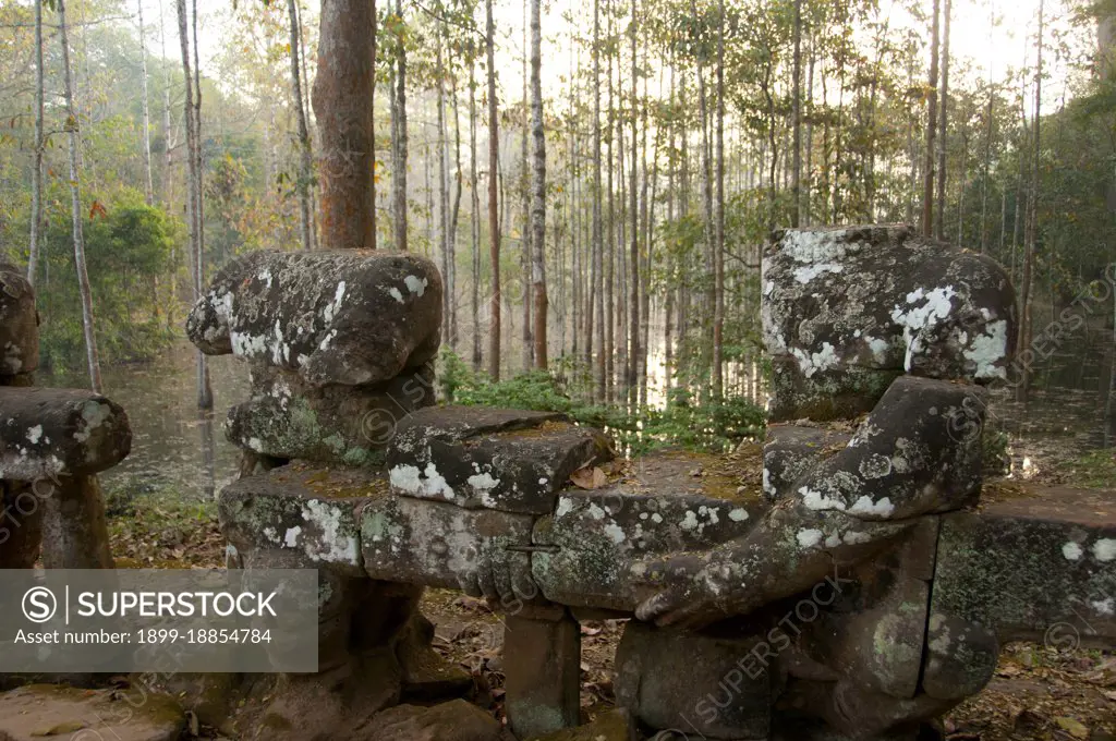 Devas are often seen in opposition to Asuras (sinful deities). Angkor Thom, meaning The Great City’, is located 1.5km (one mile) north of Angkor Wat. It was built in the late 12th century by King Jayavarman VII, and covers an area of 9 km², within which are located several monuments from earlier eras as well as those established by Jayavarman and his successors. It is believed to have sustained a population of 80,000-150,000 people. At the centre of the city is Jayavarman's state temple, the Bayon, with the other major sites clustered around the Victory Square immediately to the north. Angkor Thom was established as the capital of Jayavarman VII's empire, and was the centre of his massive building programme. One inscription found in the city refers to Jayavarman as the groom and the city as his bride. Angkor Thom seems not to be the first Khmer capital on the site, however, as Yasodharapura, dating from three centuries earlier, was centred slightly further northwest. The last temple k