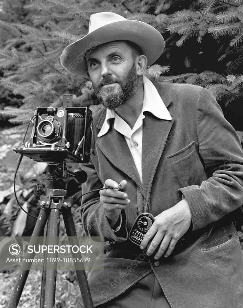 Ansel Easton Adams (February 20, 1902 - April 22, 1984) was an American photographer and environmentalist. His black-and-white landscape photographs of the American West, especially Yosemite National Park, have been widely reproduced on calendars, posters, and in books. With Fred Archer, Adams developed the Zone System as a way to determine proper exposure and adjust the contrast of the final print. The resulting clarity and depth characterized his photographs. Adams primarily used large-format cameras because their high resolution helped ensure sharpness in his images. Adams was distressed by the Japanese American Internment that occurred after the Pearl Harbor attack. He requested permission to visit the Manzanar War Relocation Center in the Owens Valley, at the foot of Mount Williamson.