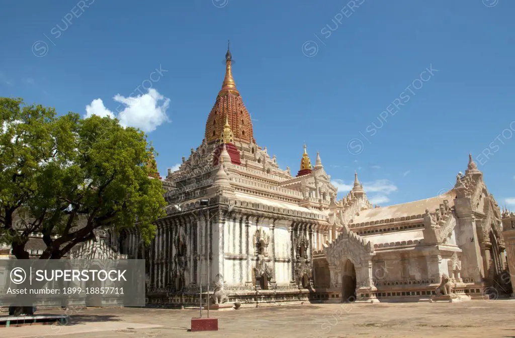 Perhaps the highest revered temple in Bagan, the Ananda Pagoda was built in 1105 CE during the reign of King Kyanzittha (1084-1113) of the Bagan Dynasty. It is one of four surviving original temples of Bagan (also called Pagan). The temple layout is in a cruciform with several terraces leading to a small pagoda at the top covered by an umbrella (hti’). The Buddhist temple houses four standing Buddhas—facing east, north, west and south. The temple is said to be an architectural wonder in a fusion of Mon and adopted Indian styles of architecture. It was damaged in the earthquake of 1975. However, it has been fully restored and is well maintained by frequent painting and whitewashing of the walls. On the occasion of the 900th anniversary of its construction celebrated in 1990 the temple spires were gilded. Bagan, formerly Pagan, was mainly built between the 11th century and 13th century. Formally titled Arimaddanapura or Arimaddana (the City of the Enemy Crusher) and also known as Tambad