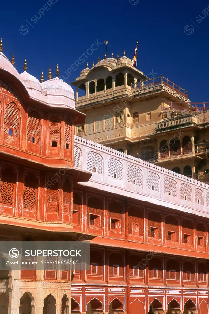 The City Palace was built between 1729 and 1732, initially by Maharaja Sawai Jai Singh II. He planned and built the outer walls, and later additions were made by successive rulers right up to the 20th century. Jaipur is the capital and largest city of the Indian state of Rajasthan. It was founded on 18 November 1727 by Maharaja Sawai Jai Singh II, the ruler of Amber, after whom the city was named. The city today has a population of 3.1 million. Jaipur is known as the Pink City of India. The city is remarkable among pre-modern Indian cities for the width and regularity of its streets which are laid out into six sectors separated by broad streets 34 m (111 ft) wide. The urban quarters are further divided by networks of gridded streets. Five quarters wrap around the east, south, and west sides of a central palace quarter, with a sixth quarter immediately to the east. The Palace quarter encloses the sprawling Hawa Mahal palace complex, formal gardens, and a small lake. Nahargarh Fort, whic