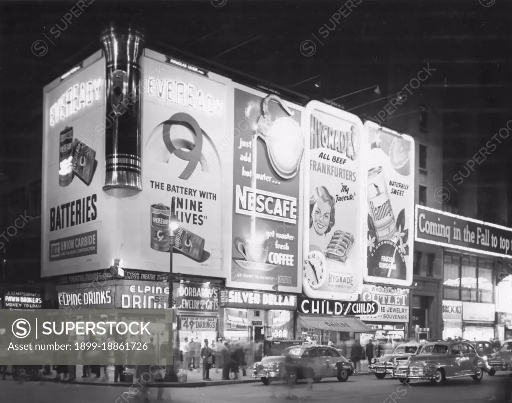 The east side of 7th Avenue in the Times Square district with W. 46th Street on the extreme left. New York City, 1951. State Department photo by Pfeiffer/ 