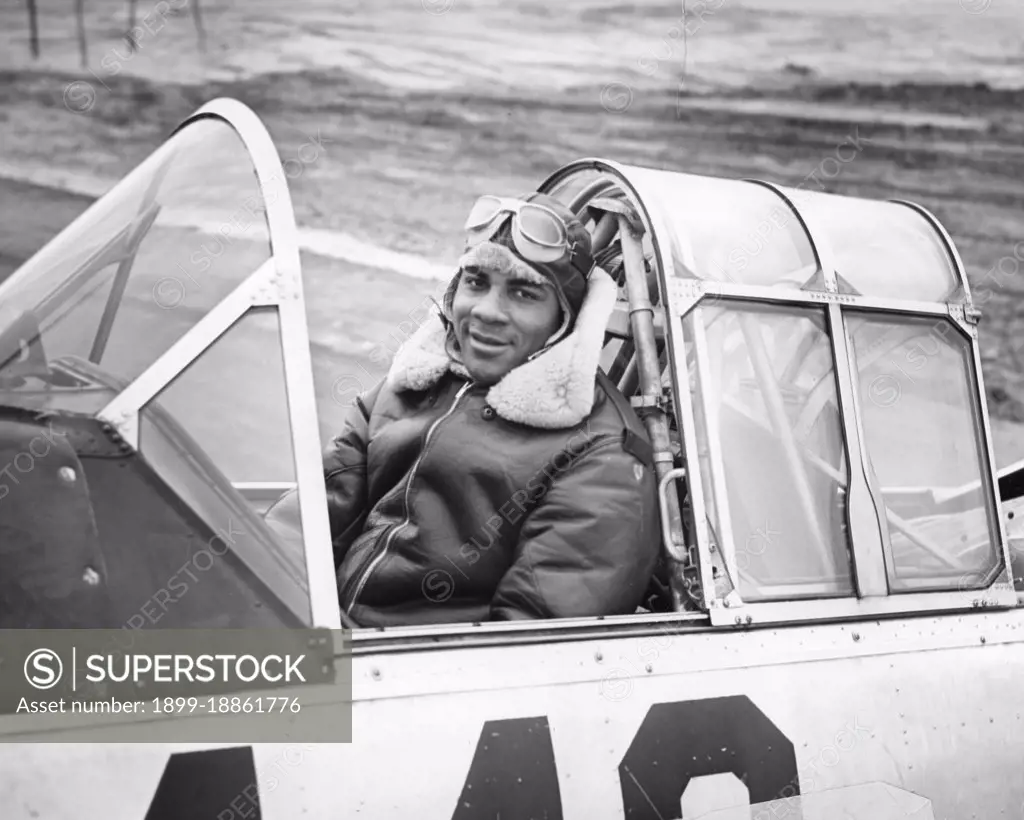 James R Smith, Cincinnati, OH, is shown in the cockpit of an Advanced Trainer at the Basic and Advanced Flying School for Negro Air Corps Cadets, Tuskegee, AL, 1/12/1942. (Photo by US Army Air Corps/GG Vintage Images)