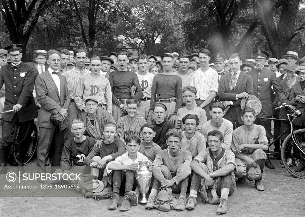 Sports team with trophy ca.  between 1918 and 1921.