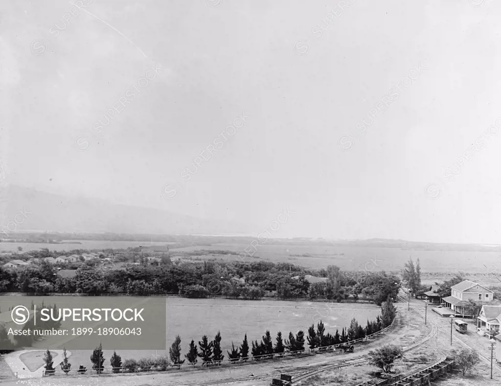 Sugar plantation. Hawaii. Showing shipping port in distance ca.  between 1910 and 1920.