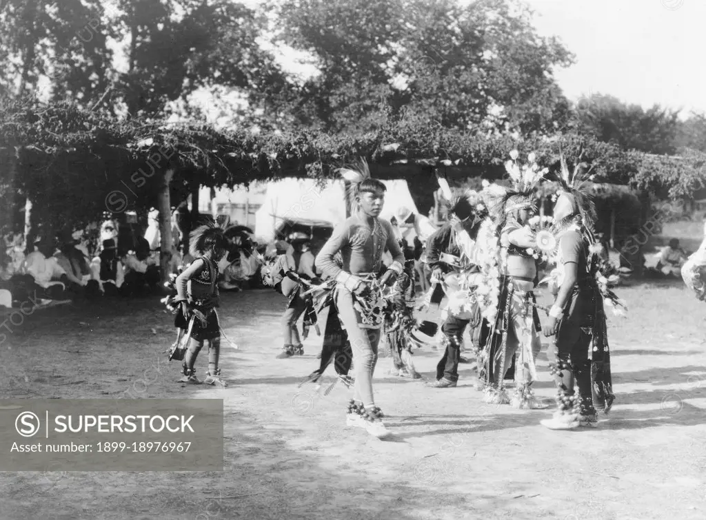Edward S. Curtis Native American Indians - Skidi and Wichita Indian dancers in ceremonial dress ca. 1927. 