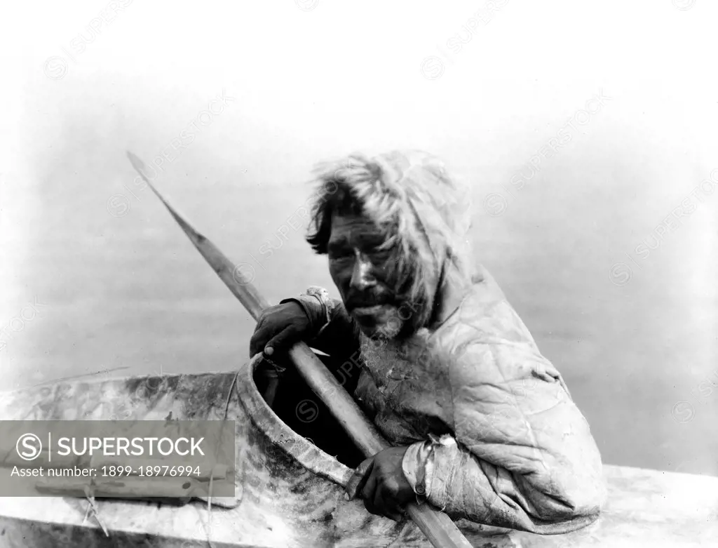 Edward S. Curtis Native American Indians - The seal-hunter, Noatak, in kayak, facing left ca. 1929. 