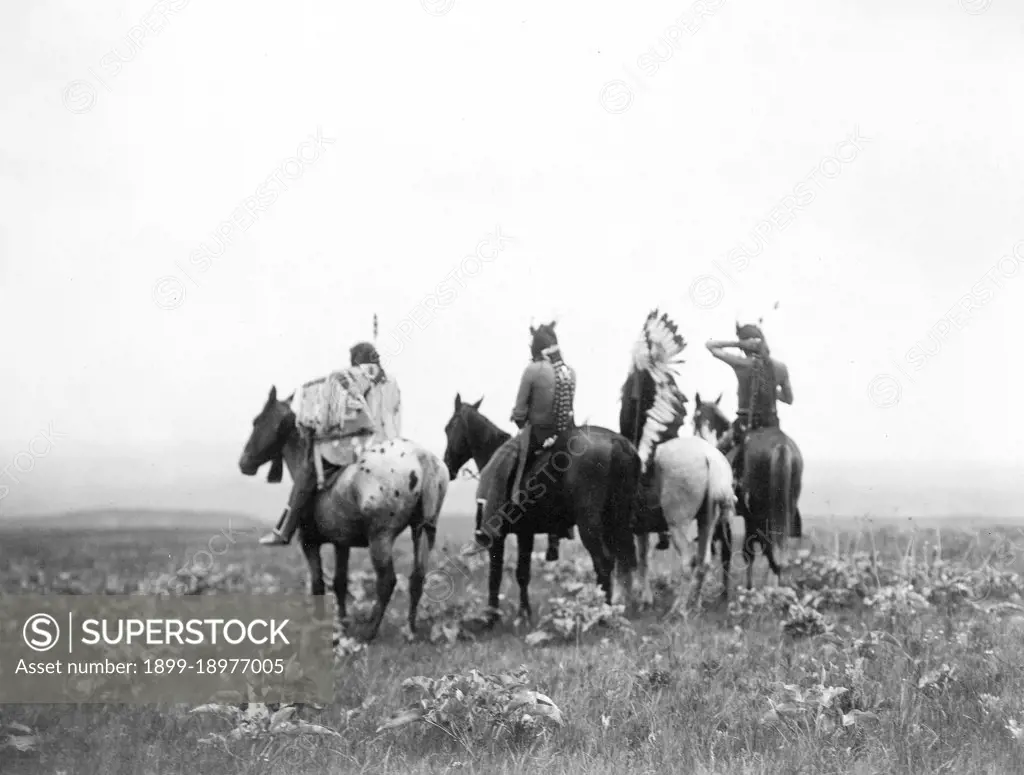 Edward S. Curtis Native American Indians - Four Crow Indians, including Shot in the Hand and Bull Chief, on horseback, Montana ca. 1905. 