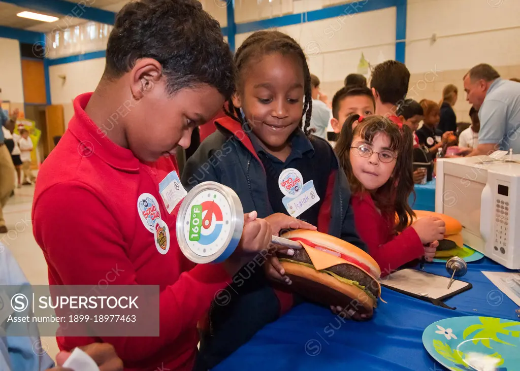 Elementery school students from Ms. Lindsay Gormuss first grade class at Maryland City Elementary School in Laurel, Maryland learn the correct temperature to cook hamburgers at the USDA, Food Safety Inspection Service, Food Safety Education Camp held at Maryland City Elementary, Thu, May 5, 2011. 