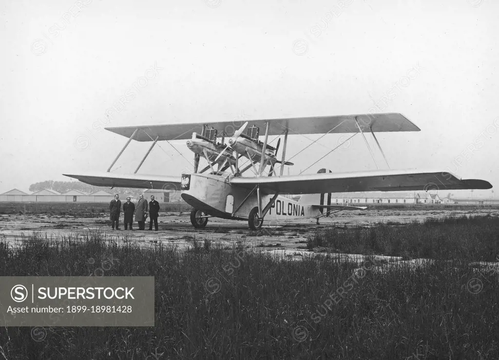 Visible: Polish American activist Adamkiewicz (2nd on the right), lieutenant pilot of the reserve from PLL 'Lot' Wodzimierz Klisz (3rd on the right), captain pilot from the 3rd Air Regiment Adam S. Kowalczyk (1st on the left).. 