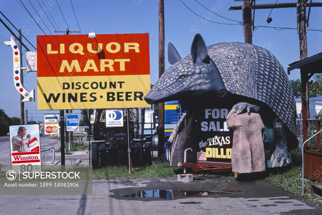 1980s America -   Armadillo sign float, San Antonio, Texas 1982. 