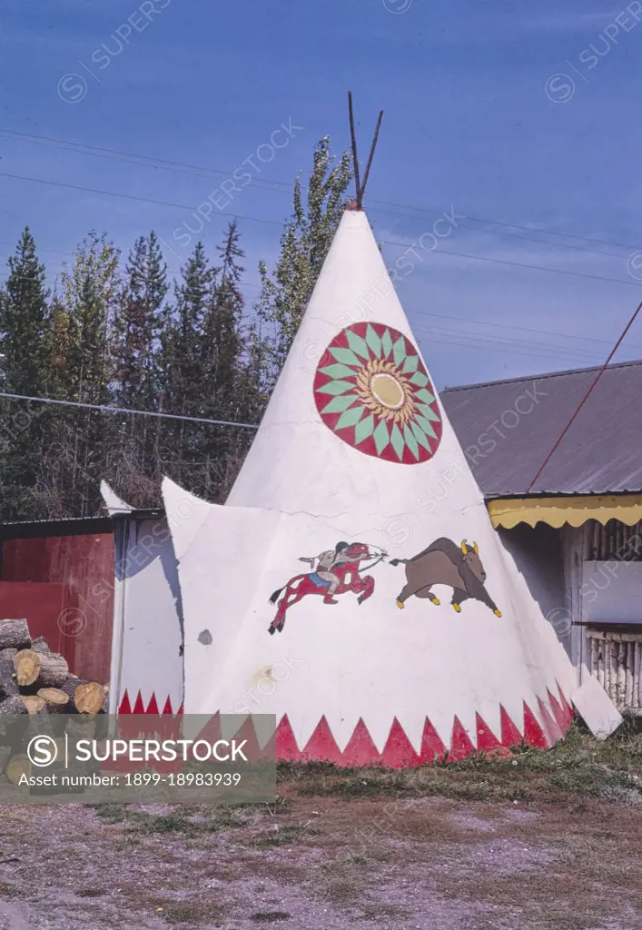 1980s United States -  Teepee BBQ at The Huckleberry Patch, Route 2, Hungry Horse, Montana 1987. 