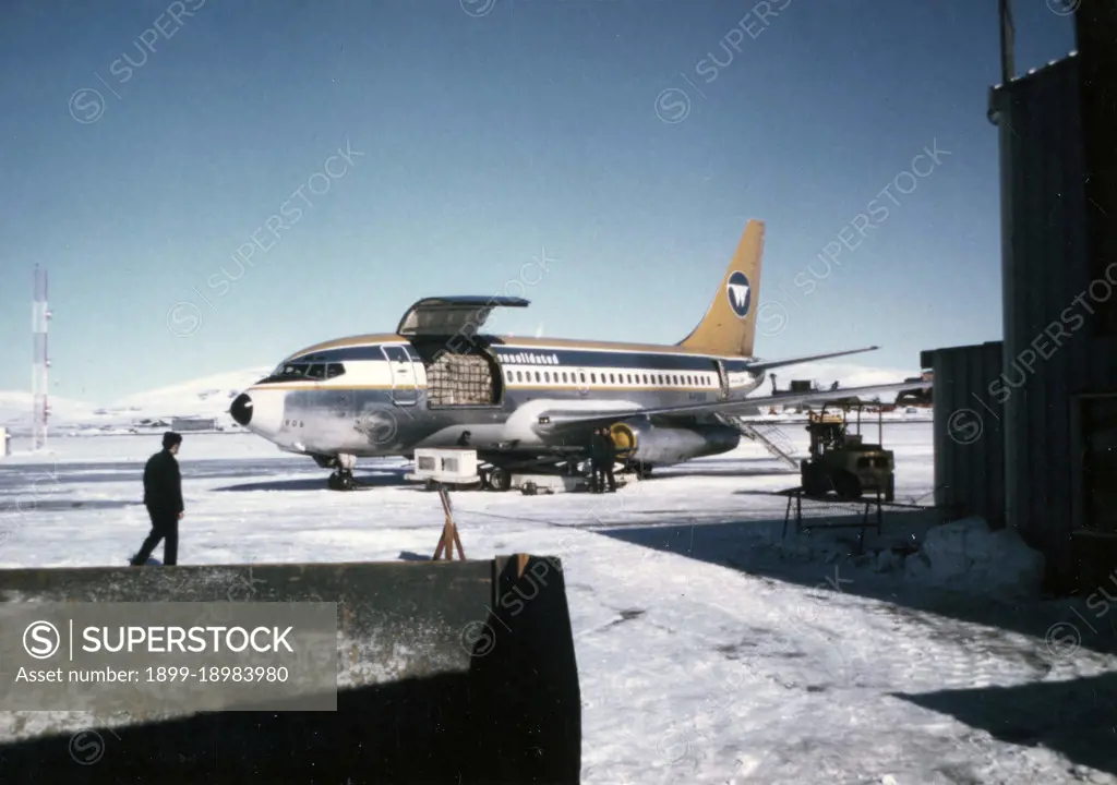 Wien Consolidated Airlines being loaded at the Nome Airport ca. March 1974. 