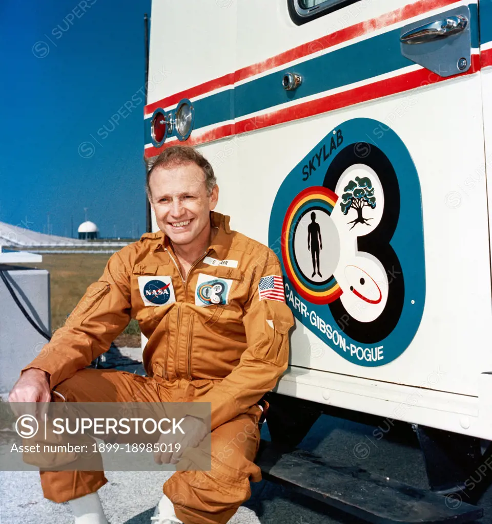 (8 Nov. 1973) --- Astronaut Gerald P. Carr, commander of the Skylab 4 mission, relaxes on the running board of the transfer van during a visit to the Skylab 4/Saturn 1B space vehicle at Pad B, Launch Complex 39, at the Kennedy Space Center, Florida.. 