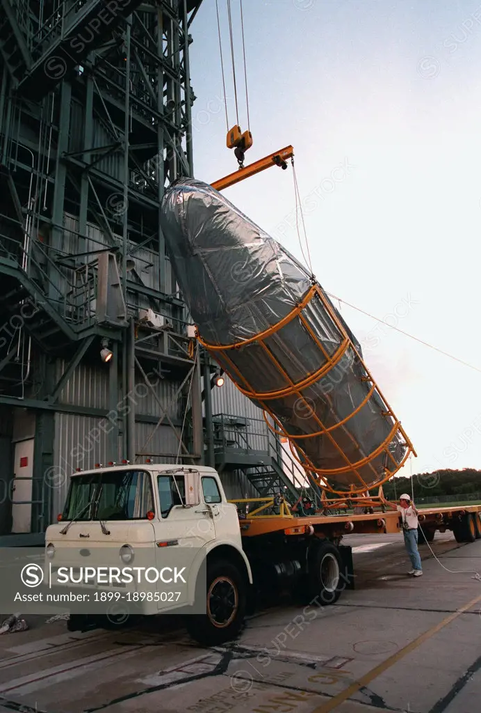 KENNEDY SPACE CENTER, FLA. -- Arriving in the early morning hours at Pad 17A, Cape Canaveral Air Station, the fairing for Deep Space 1 is lifted from the truck before being raised to its place on the Boeing Delta 7326 rocket that will launch on Oct. 15, 1998. . 