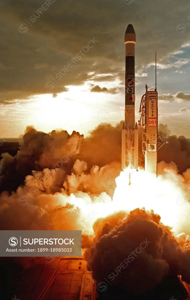 KENNEDY SPACE CENTER, FLA. -- A Boeing Delta II (7326) rocket lights up the clouds of exhaust below as it propels Deep Space 1 into the sky after liftoff from Launch Complex 17A, Cape Canaveral Air Station. . 