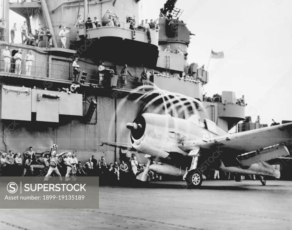 USA: US Navy Grumman F6F Hellcat fighter preparing to launch off USS Yorktown to attack a target in the Japanese-controlled Marshall Islands, 20 November 1943